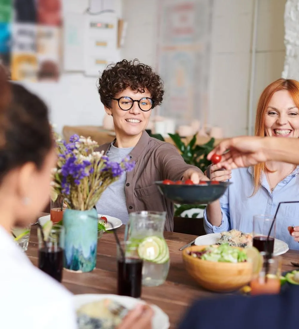 Friends sharing a meal around a table